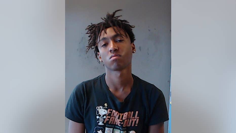 Police said 21-year-old Christopher Jean-Pierre is accused of shooting a McDonald's manager outside of the restaurant.