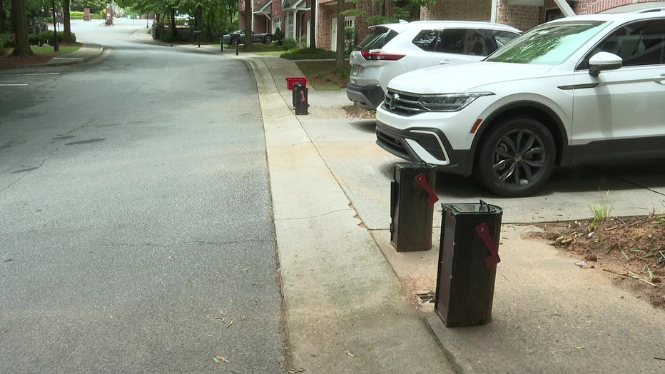 Mailboxes are left without posts in the Glenridge Creek Townhomes after a car slammed into them on June 5, 2022.