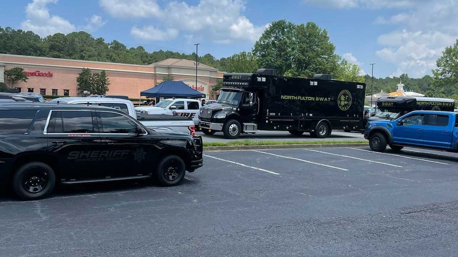 SWAT at the scene of a HomeGoods in Alpharetta where an armed suspect is allegedly hiding.