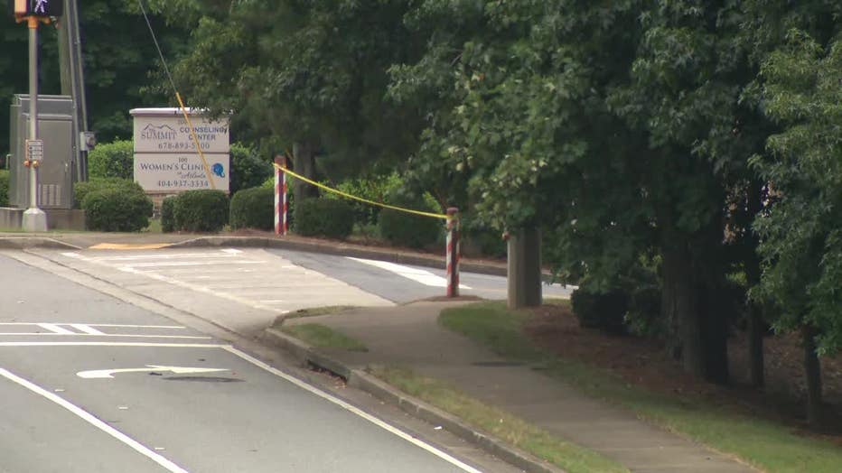 Police closed a road to investigate a "suspicious package" near a Johns Creek women's clinic.