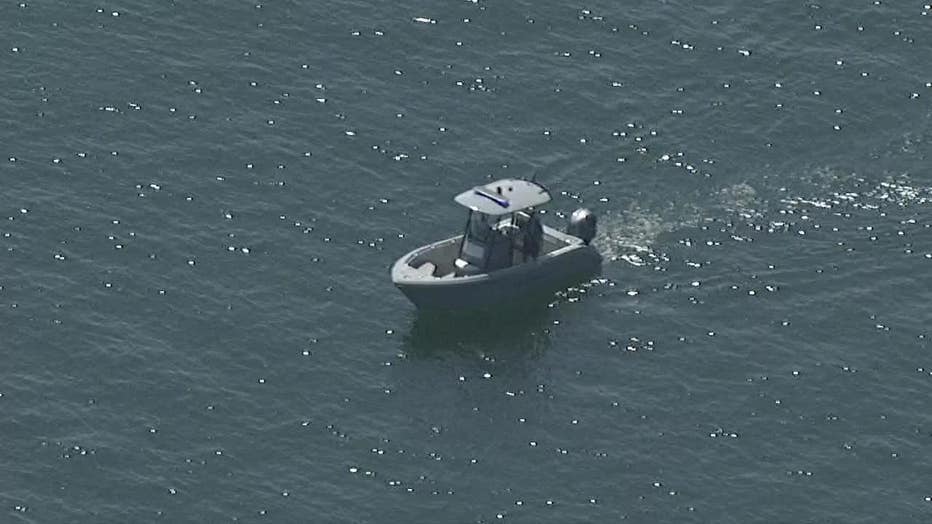 The Georgia Department of Natural Resources searches for a missing man near Holiday Marina on Lake Lanier on June 20, 2022.