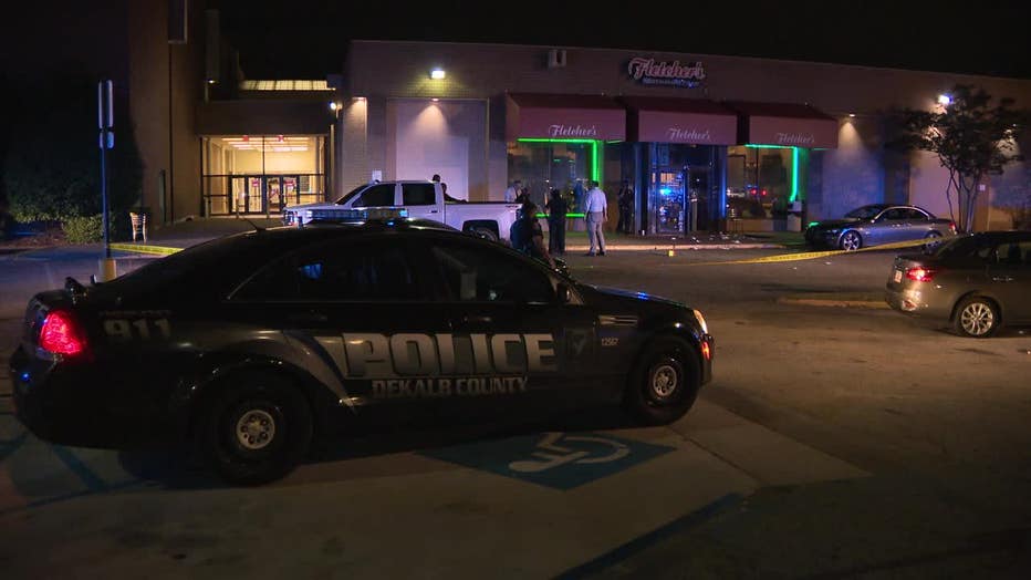 Police investigate what led to four people shot at The Gallery at South DeKalb Mall on Friday night.