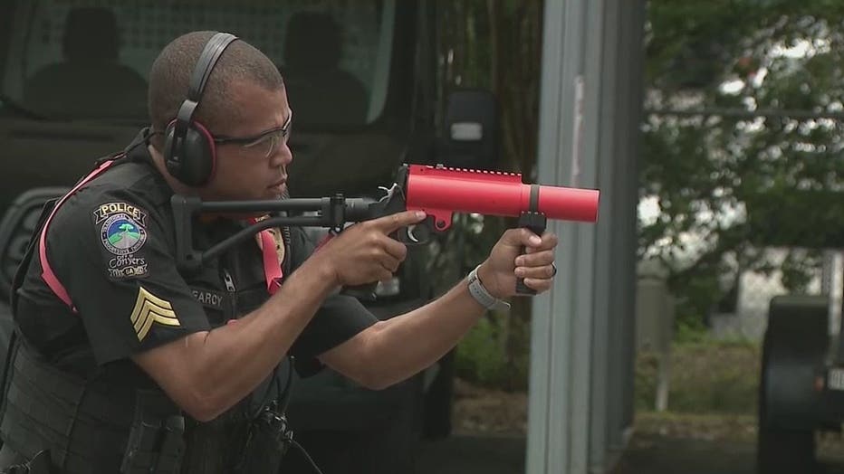 Conyers police demonstrate their new less-than-lethal weapon