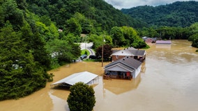 Kentucky flooding: At least 25 dead as search for victims continues