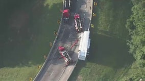 Overturned tractor-trailer blocks I-285 exit ramp to I-20