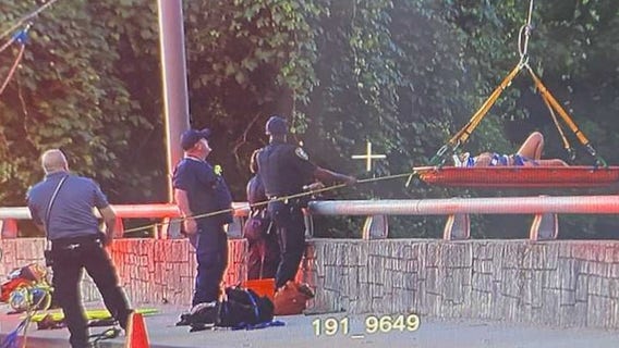 Woman rescued from Camp Creek in East Point, fire officials say