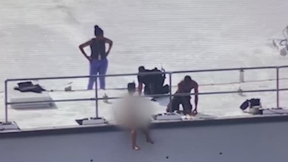 Fulton deputy removes shirt, weapons to help woman on courthouse rooftop