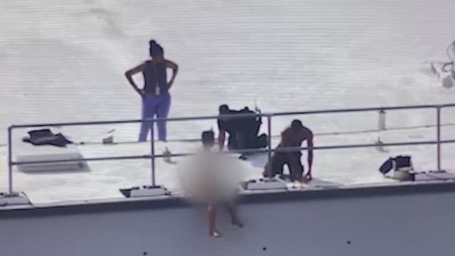 Fulton deputy removes shirt, weapons to help woman on courthouse rooftop