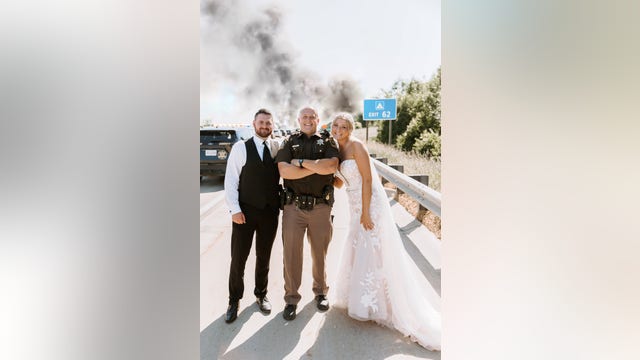 Wedding party celebrates along side of west Michigan freeway after limo catches fire on way to reception