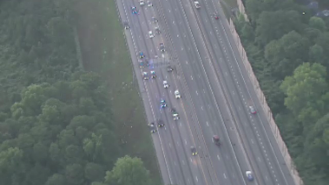 At least 1 killed when car carrying 9 rolls down embankment from I-20, police say