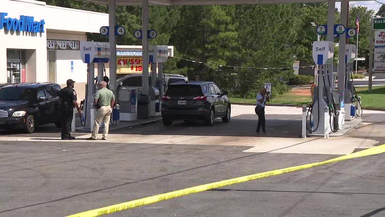 Two people were injured after exchanging gunfire outside a DeKalb County gas station on July 26, 2022.