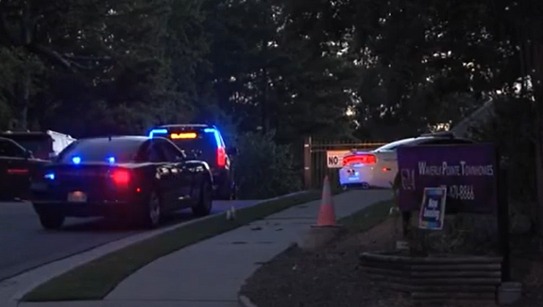The Bibb County Sheriff’s Office investigates a deadly shooting at a Macon apartment complex on July 26, 2022.
