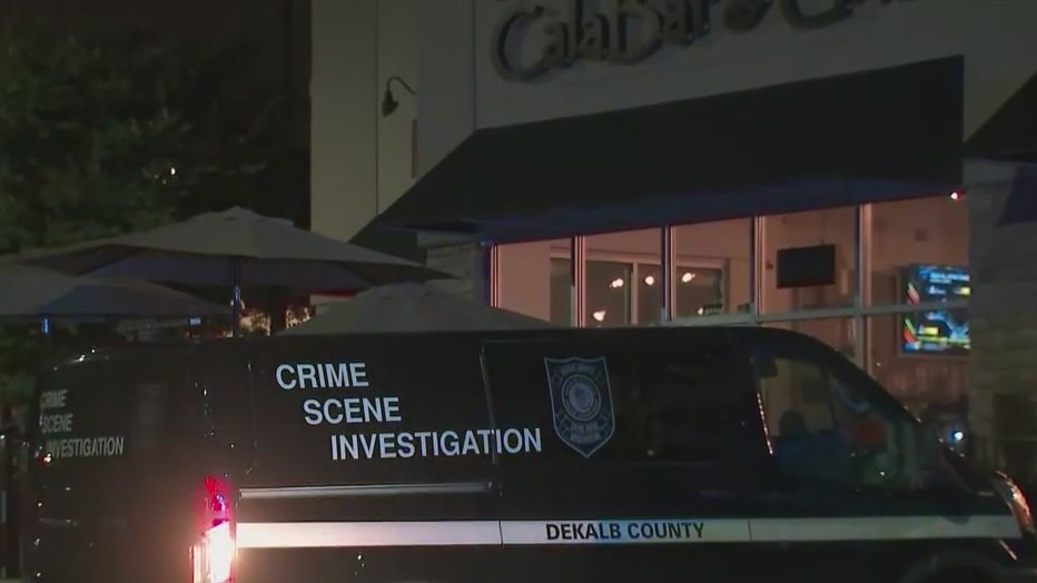 DeKalb County police responds to a shooting at a bar along Redan Road on July 9, 2022.