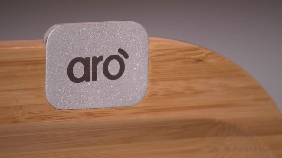 Aro recharges your devices while you step away and rewards you for reading, exercising, napping or talking.