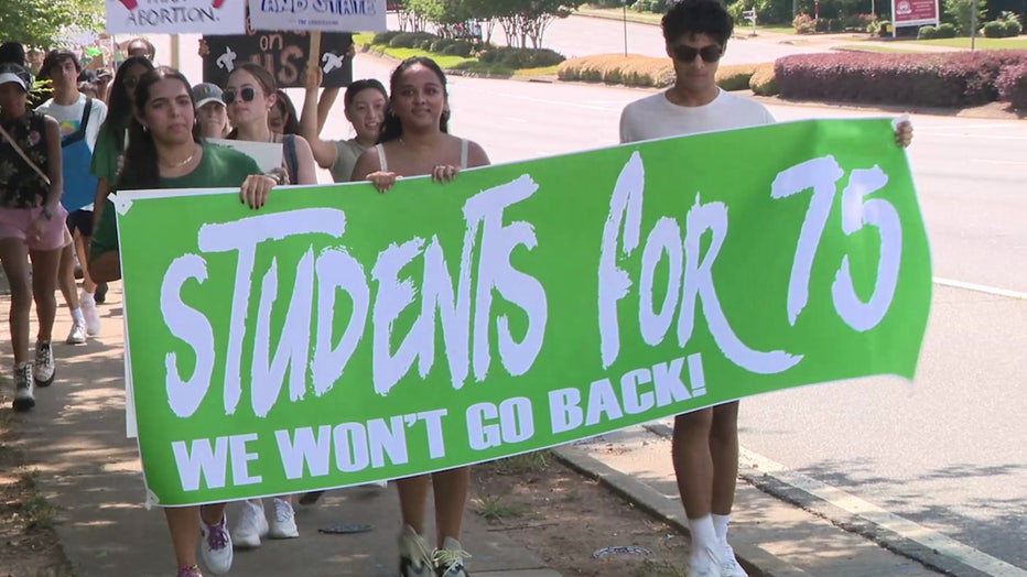 Students protest the Supreme Court's decision to overturn the Roe v. Wade ruling in Alpharetta.