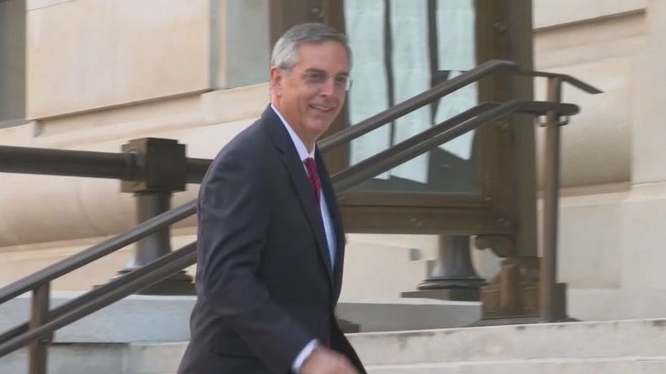 Georgia Secretary of State Brad Raffensperger walks into the Fulton County Courthouse to testify before the special grand jury in the Trump election probe on June 2, 2022.