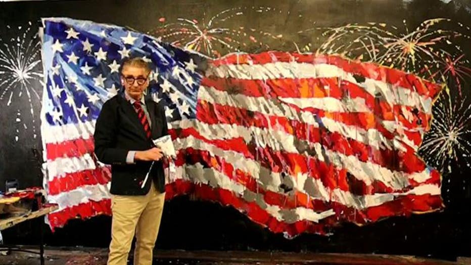 Visual artist Steve Penley stands in front of his Independence Day painting revealed on "Fox and Friends," on July 4, 2022. (Fox News)