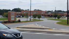 Student brought 2 guns to McDonough school, 1 accidentally discharges, officials say