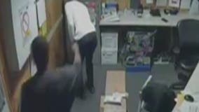 Video shows CVS manager being held at gunpoint, suspect on the run
