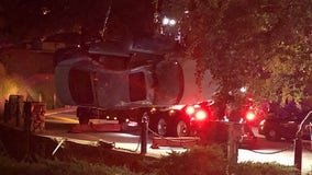 Driver rescued after car flips over into Stone Mountain pond