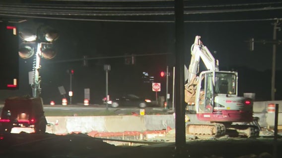 GDOT crews inspect support beams under bridge after fiery crash on I-285