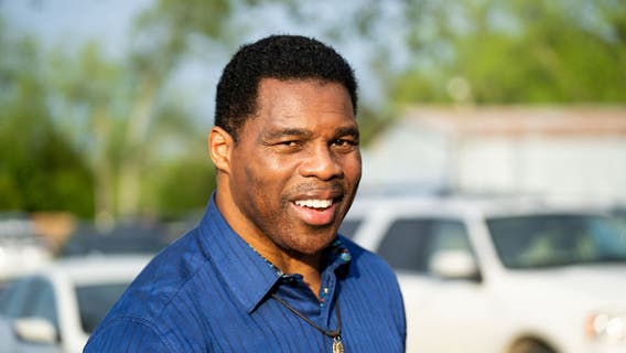 Herschel Walker targeted in campaign ad using ex-wife’s accusations: ‘He was gonna blow my brains out’
