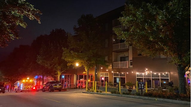 Woman shot at Westside apartment complex, man detained