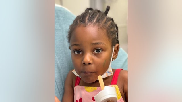 Police find parents of child found wandering alone with backpack