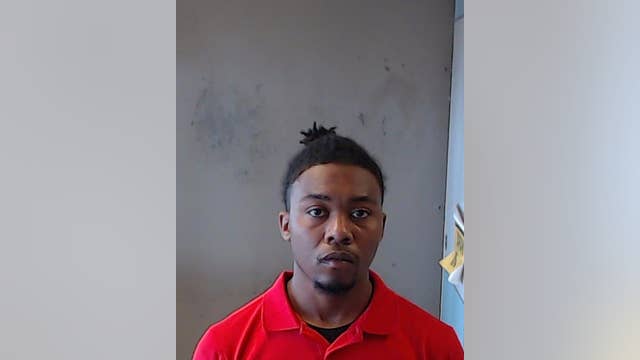 Suspect charged with murder of Lithonia teen found shot in the head in crashed car, police say