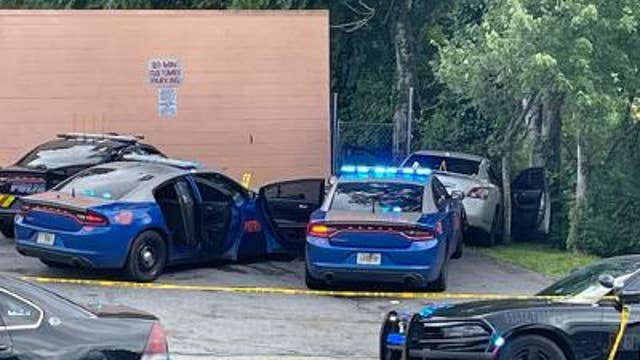 Police: Man running from officers was suspect in homicide