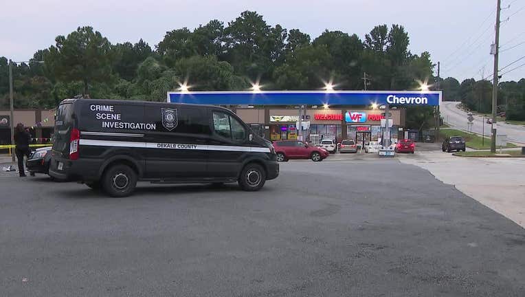 DeKalb County police investigate a shooting near the intersection of Panola and Redan roads on August 23, 2022.