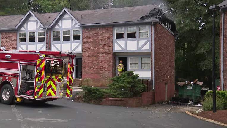 Firefighters investigate a blaze on Old Concord Road in Smyrna.