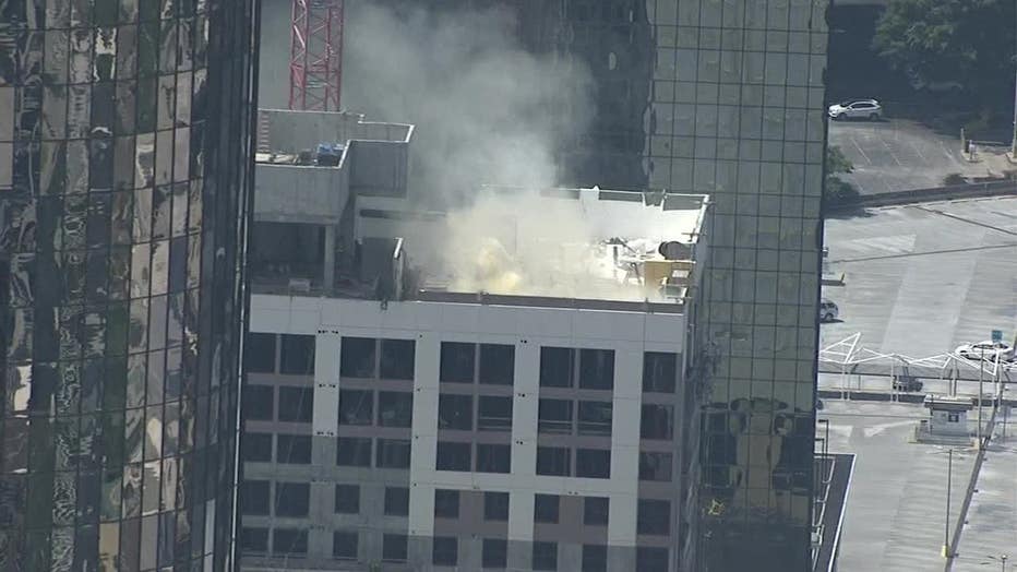 Smoke seen coming from a building in Downtown Atlanta on Aug. 31, 2022.