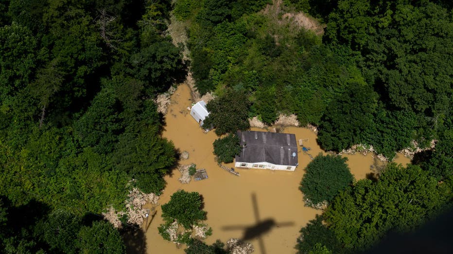 197971df-At Least 25 Die As Major Flooding Ravages Eastern Kentucky After Heavy Rains