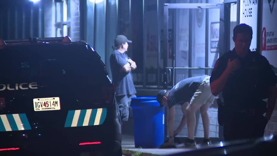 Police investigate a break-in at TruPrep Emergency Preparedness on Cobb Parkway in Marietta.