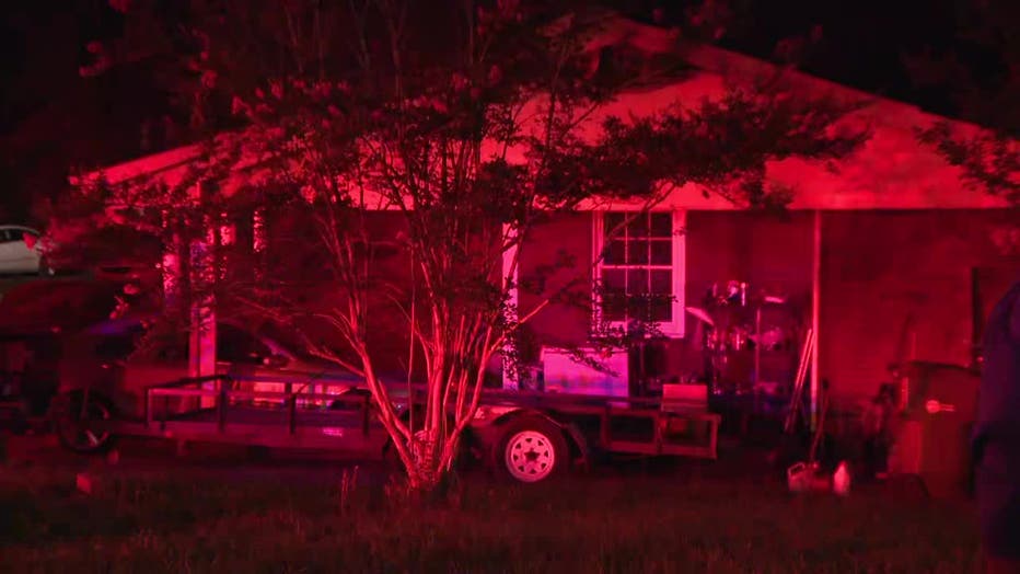 Firefighters battle a blaze at a home along Colorado Trail in southwest Atlanta on August 3, 2022.