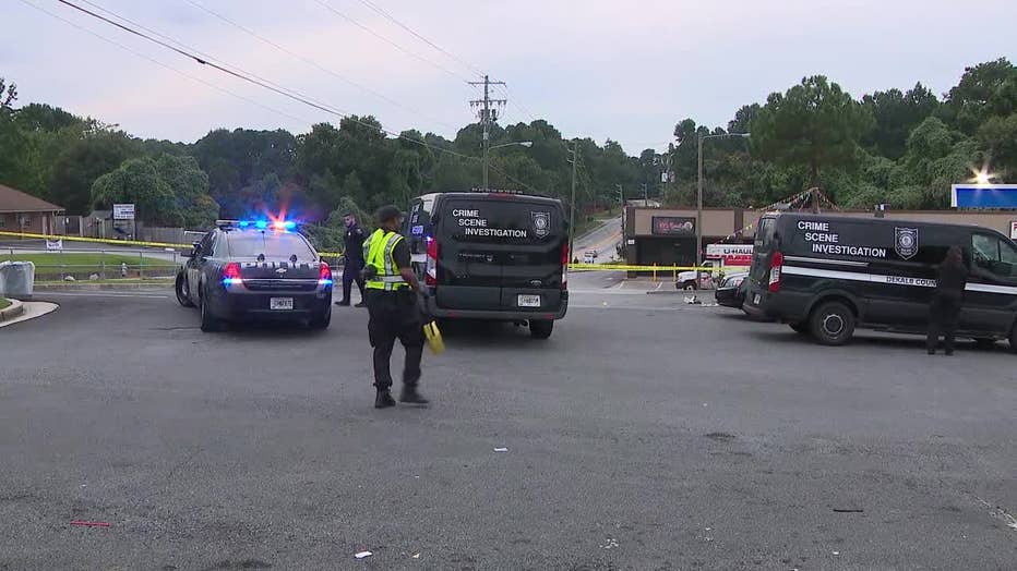 DeKalb County police investigate a shooting near the intersection of Panola and Redan roads on August 23, 2022.