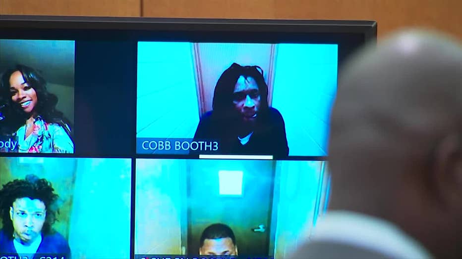 Jeffery Williams, better known by his stage name Young Thug, appeared in court with several others who were re-indicted on additional charges into a street gang investigation in Fulton County.