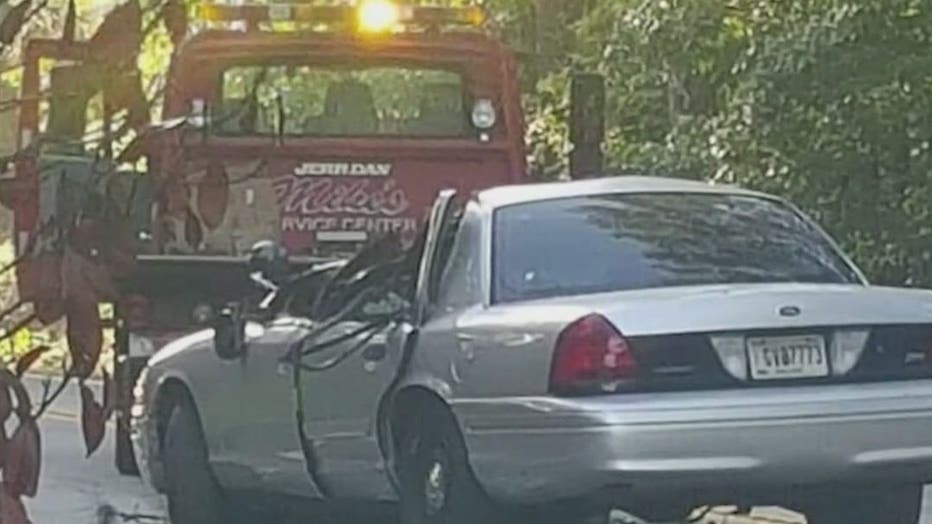 The patrol car of Spalding County Sheriff's Office Deputy Jamie Reynolds, who was killed by a falling tree along GA-16 near Shoal Creek Road on July 31, 2022.