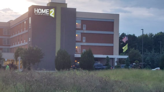 Wanted murder suspect in custody after standoff with police at Henry County hotel