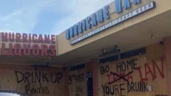 ‘Go home, Ian, you’re drunk’: Floridians use plywood to tell Hurricane Ian what they think