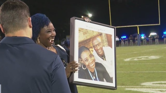 Fallen Fairburn officer honored during high school football game