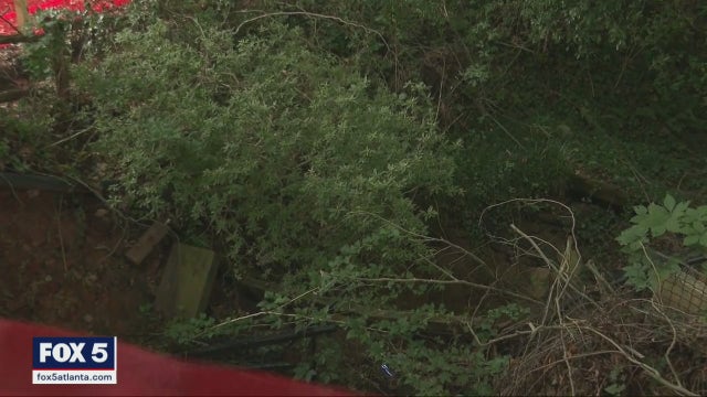 Massive sinkhole prompts concerns of a mudslide for DeKalb County homeowners bracing for heavy rain