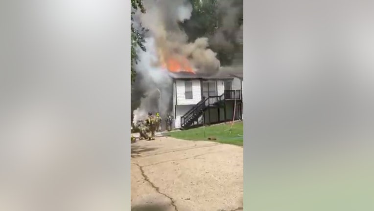 Firefighters respond to a blaze in Lawrenceville involving a home and vehicle. 