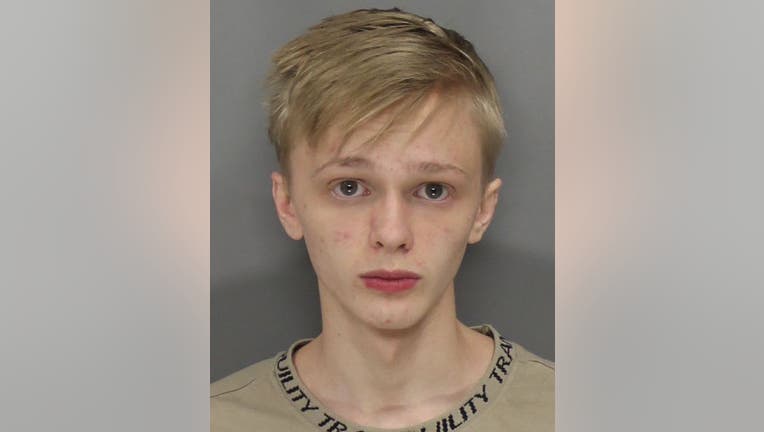 19 year old charged with possessing distributing child porn 