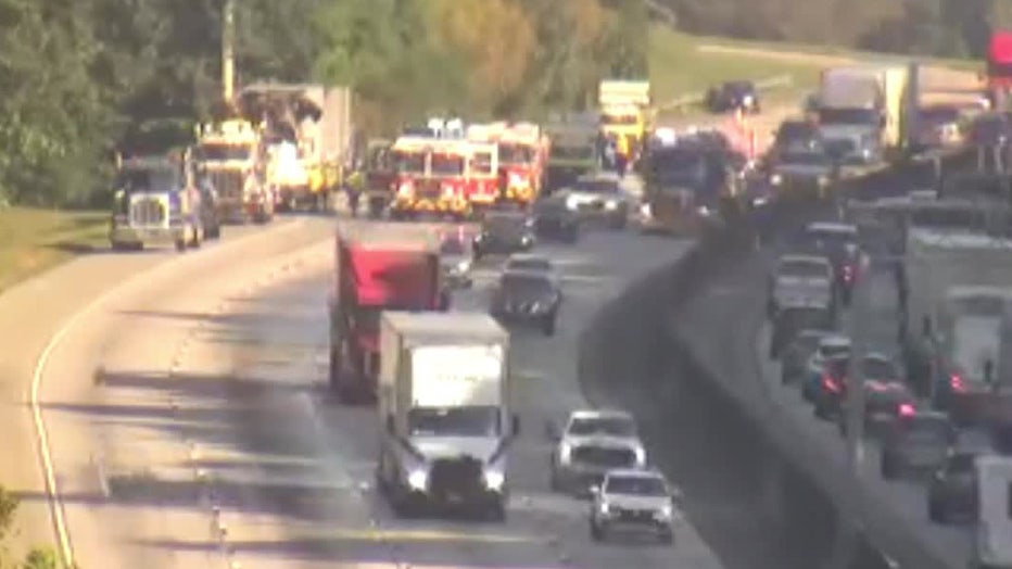 A Georgia Department of Transportation traffic camera showed Interstate 285 South lanes re-open south of the entrance ramp from Langford Parkway while crews try to clear a vehicle that was on fire.
