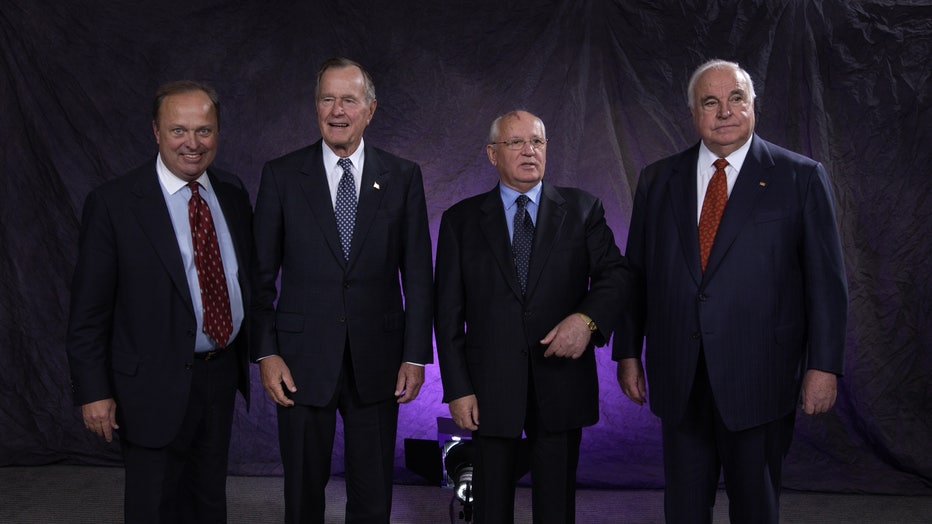 From left: Tom Harrold, former U.S. President George H.W. Bush, former Soviet Union President Mikhail Gorbachev and former German Chancellor Helmut Kohl.