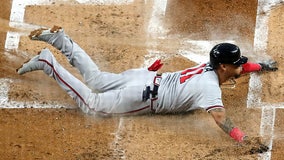 Braves beat Marlins 2-1, clinch 5th straight NL East title