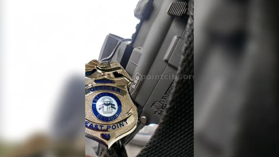 "I am God," woman yells while waving gun, East Point police say