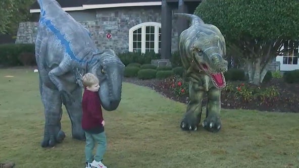 Golfers, dinosaurs come out to help 6-year-old Woodstock boy battling cancer